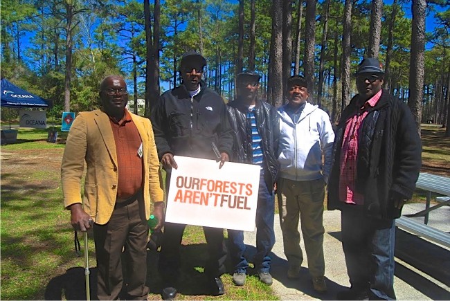 Jame (JC) Woodley of the Greenville Cypress Group of the Sierra Club and friends attend Forest Fest in Wilmington, NC. JC is from Garysburg, NC, and has witnessed firsthand the devastating affects of Enviva's wood pellet facility. 